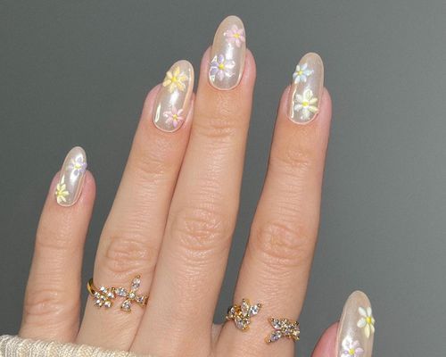 Vanilla chrome manicure with pastel floral designs