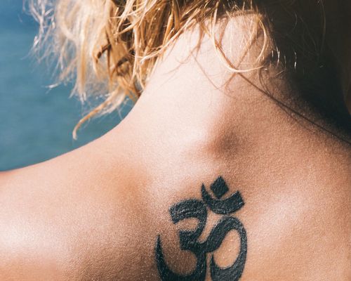 Om tattoo neck