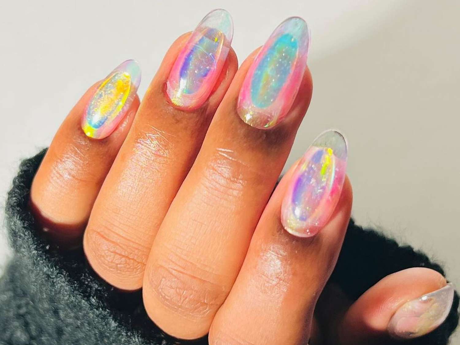 An opal iridescent builder gel manicure