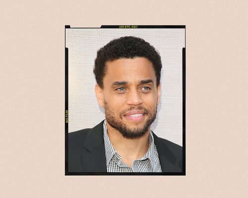 A headshot of actor Michael Ealy, with a beard.