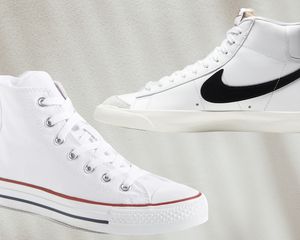 Two pairs of white high-top sneakers