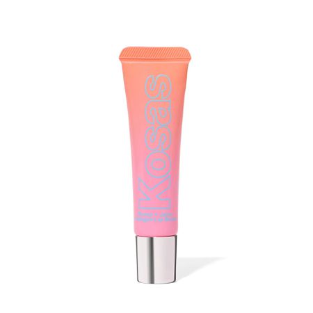 Kosas Plump + Juicy Lip Booster Buttery Treatment in a pink and orange packaged tube