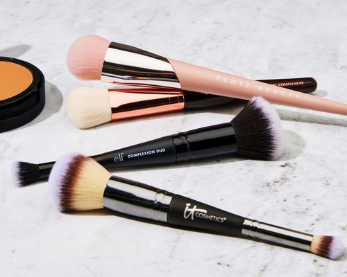 Best foundation brushes displayed on a marble counter