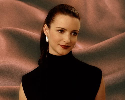 Charlotte York wearing silver hoops and turtleneck in Sex and the City