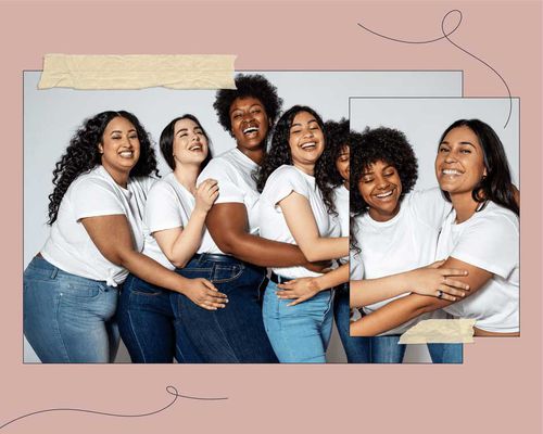 group of women in white shirts and jeans embracing