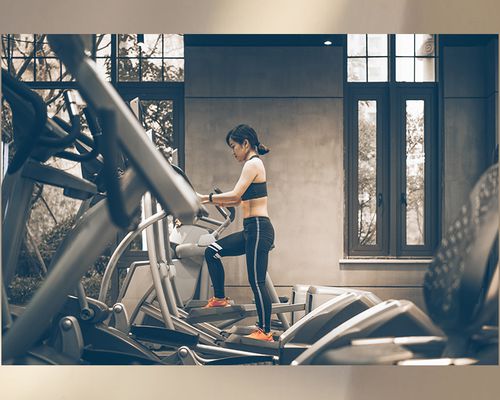 A woman working out on an elliptical 