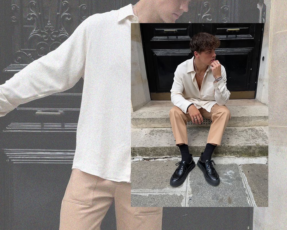 Noah Beck sitting down white shirt tan pants