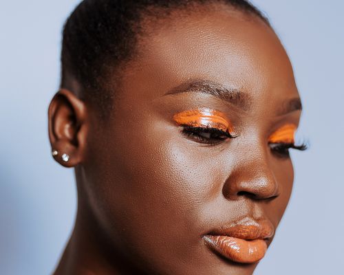 closeup of person wearing full face makeup