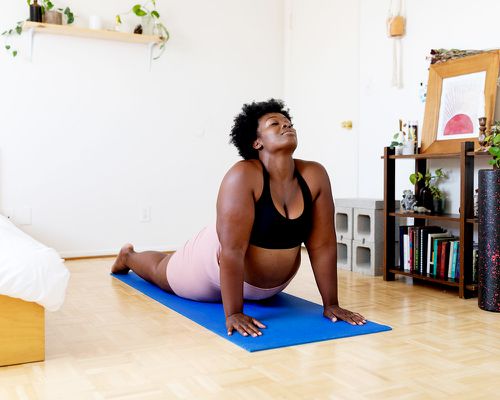 person doing yoga at home