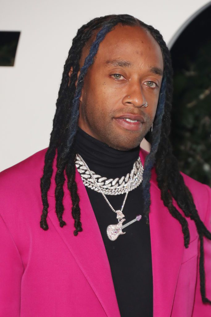 Ty Dolla $ dreadlocks with blue face-framing locs