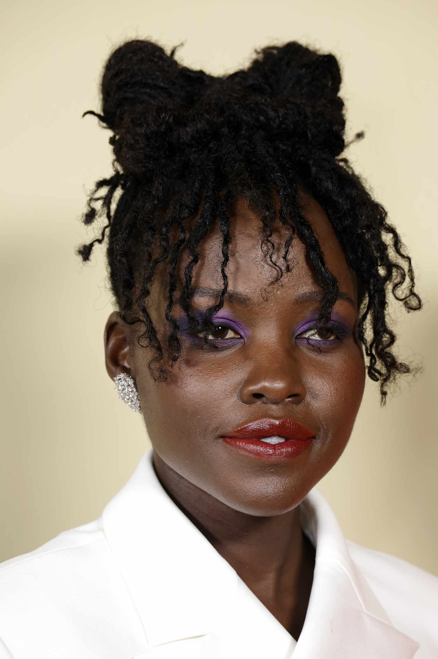 lupita nyong'o with a bow hairstyle