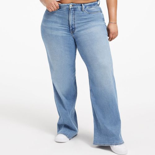 Good American Good Skate Wide Leg Jeans in light wash indigo on model