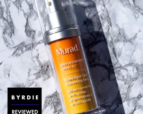 Murad Rapid Dark Spot Correcting Serum displayed on marble countertop