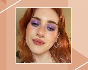 Woman with Red Hair wearing Vibrant Purple Eyeshadow and Drawn on Natural Looking Freckles