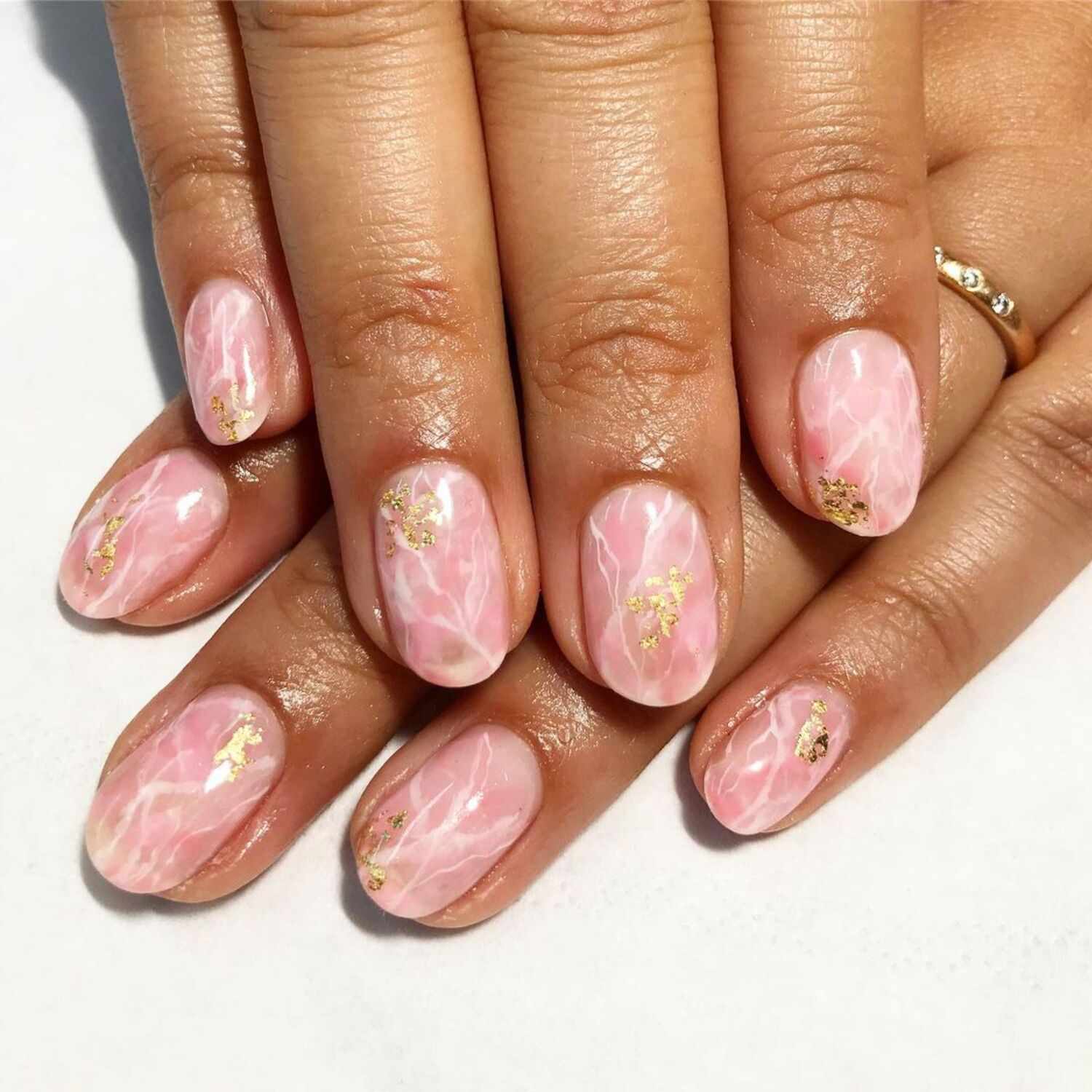 A marble baby pink manicure