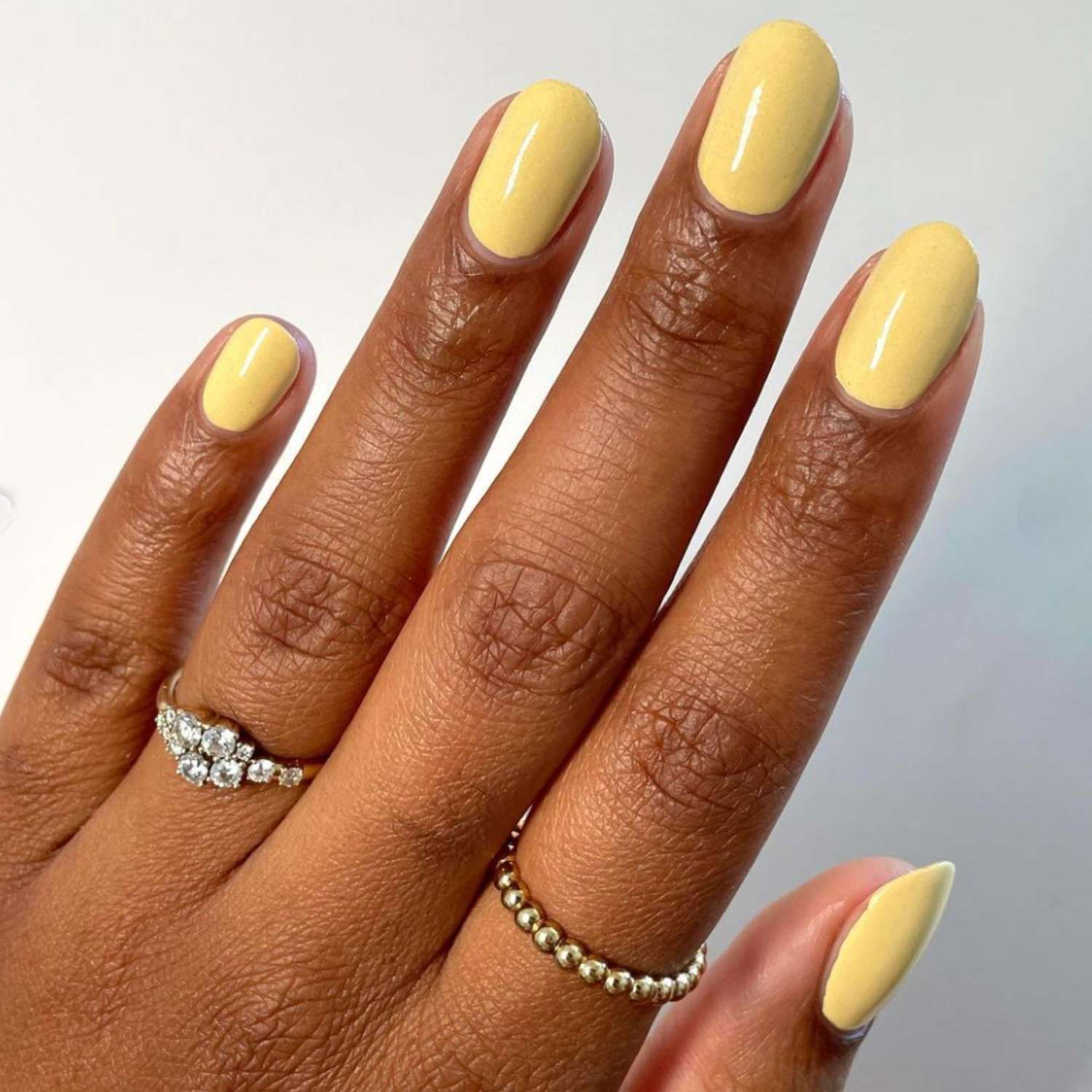 Butter yellow manicure.