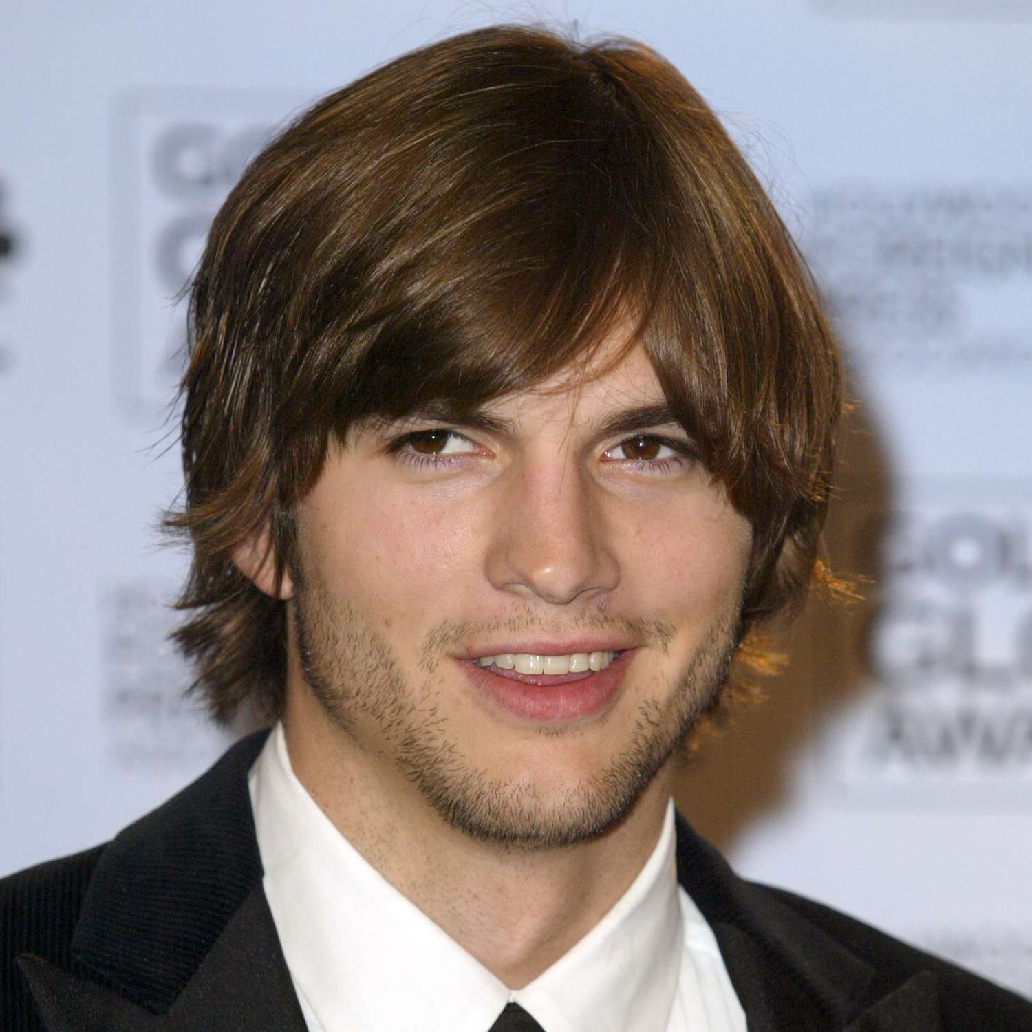 long hairstyles for men - ashton kutcher