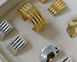 silver and gold rings in jewelry box