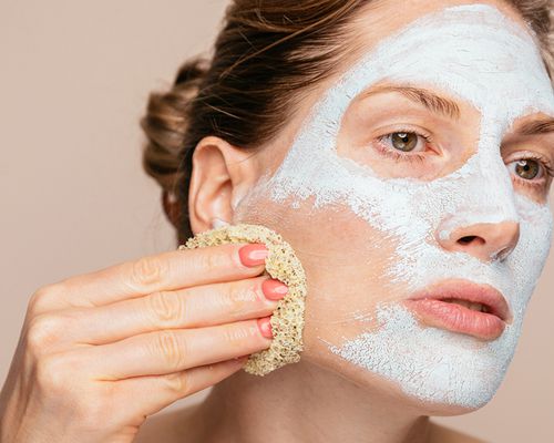 woman washing face