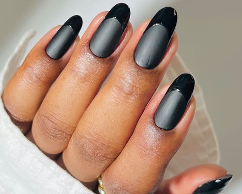 Manicure with matte black base and glossy black French tips