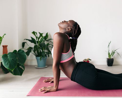 woman doing pelvic floor stretch