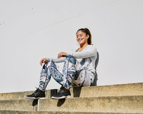 happy person takes a break from workout 