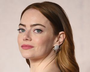 Emma Stone with red hair and pink lips