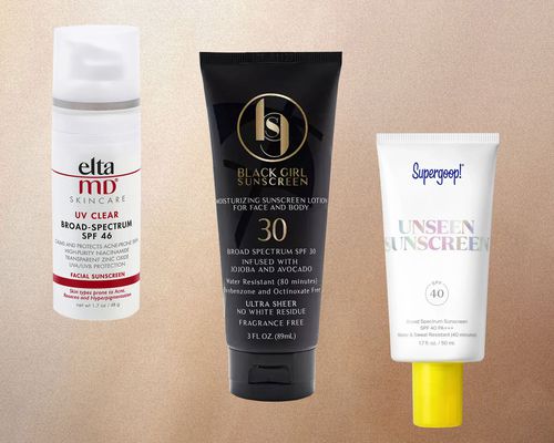 Three sunscreens for acne-prone skin we recommend displayed against a brown background 