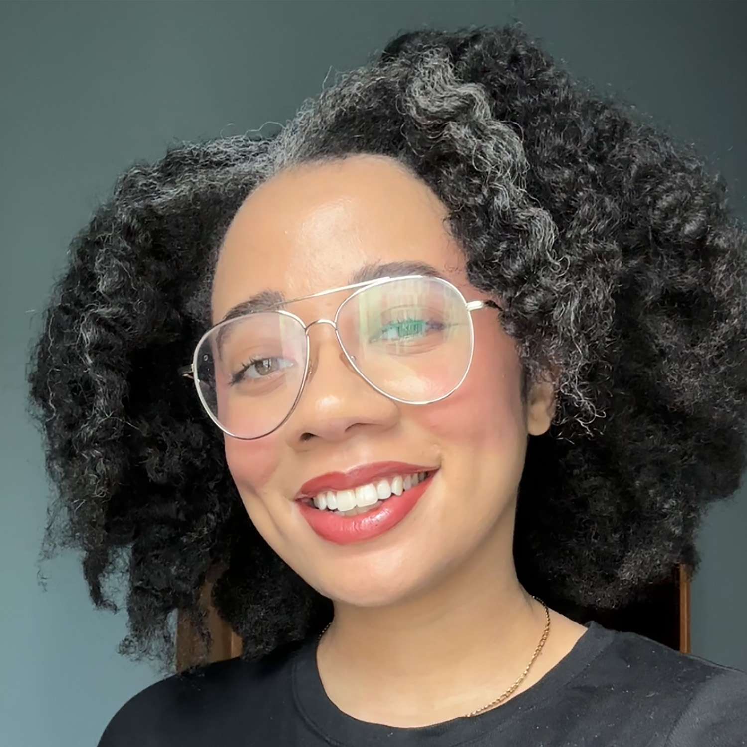 Eden Stuart from Byrdie trying Tower 28's new Lip Softie