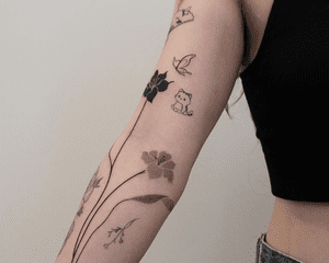 flower forearm tattoo