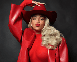 Beyonce wearing a red cowboy hat