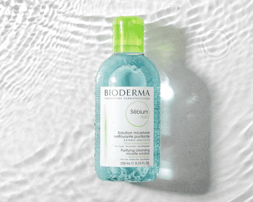 bioderma micellar water on light watery background