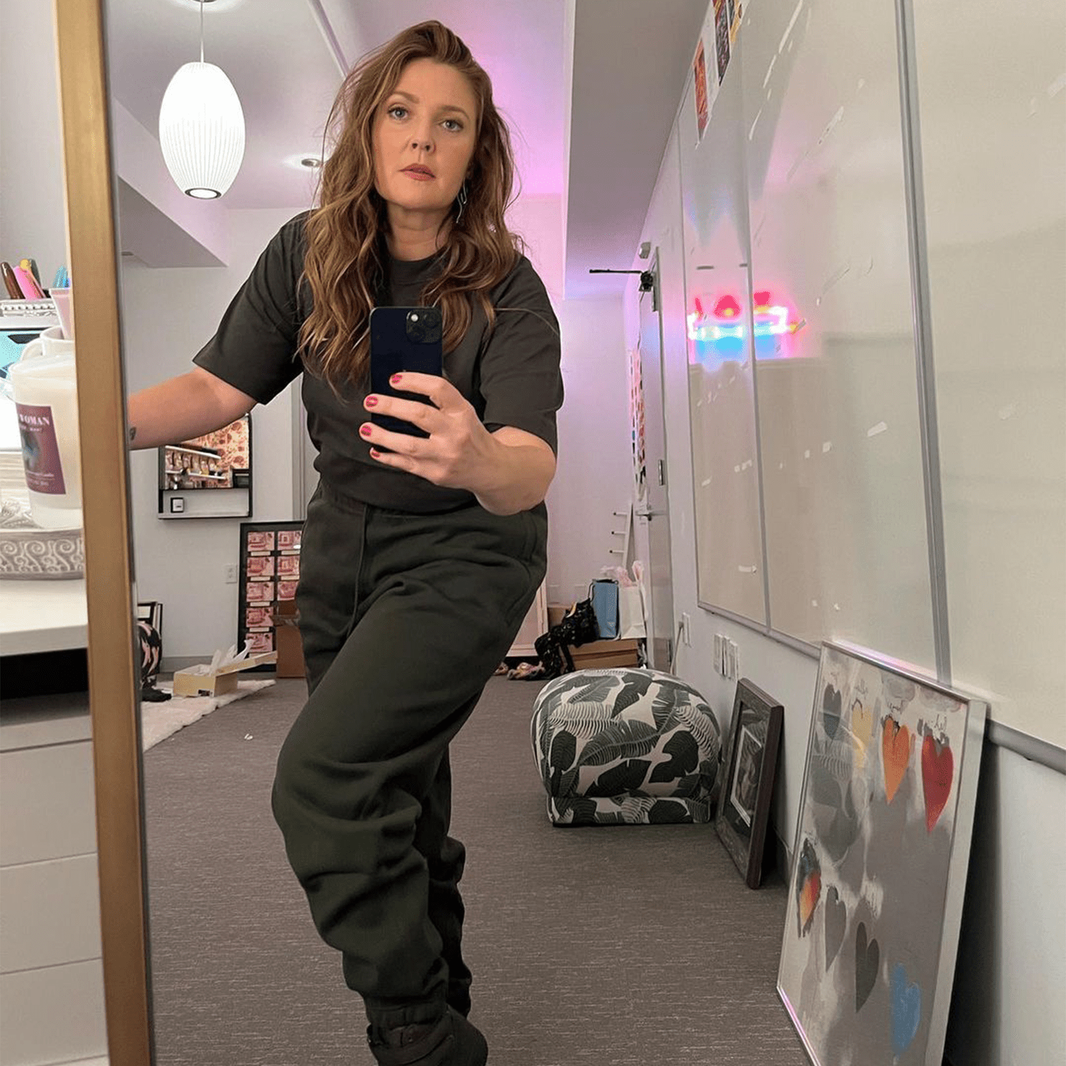 Drew Barrymore taking selfie in a mirror