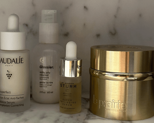 expensive skincare on marble counter