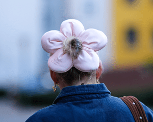 Woman wearing a flower-shaped scrunchie