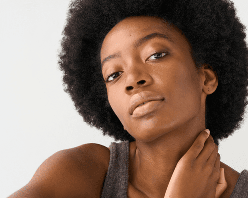 Close up of a woman's face with clear skin