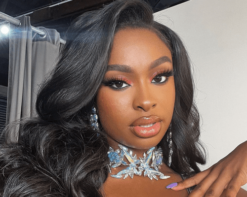 coco jones wearing hollywood waves