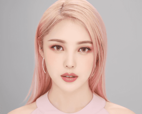 Korean girl with pink hair and blurred skin