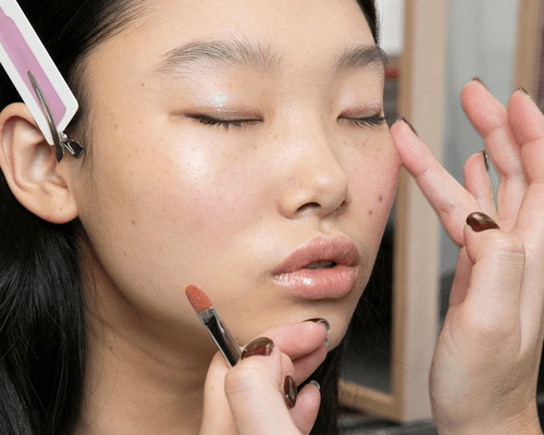 Bae Yoon Young at Milan Fashion Week having her makeup done backstage