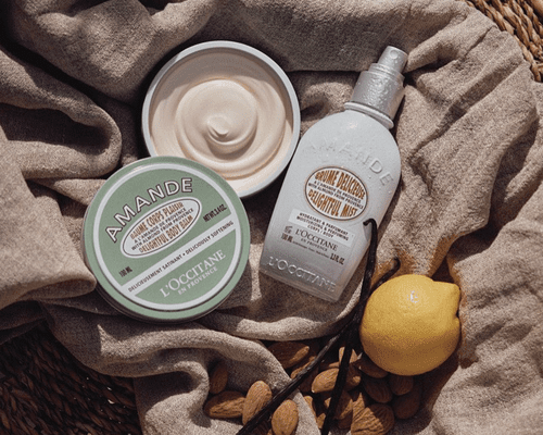 loccitane products on a linen background