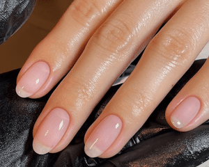 Close-up of a "naked" French manicure