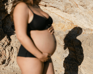 Pregnant woman in a bikini