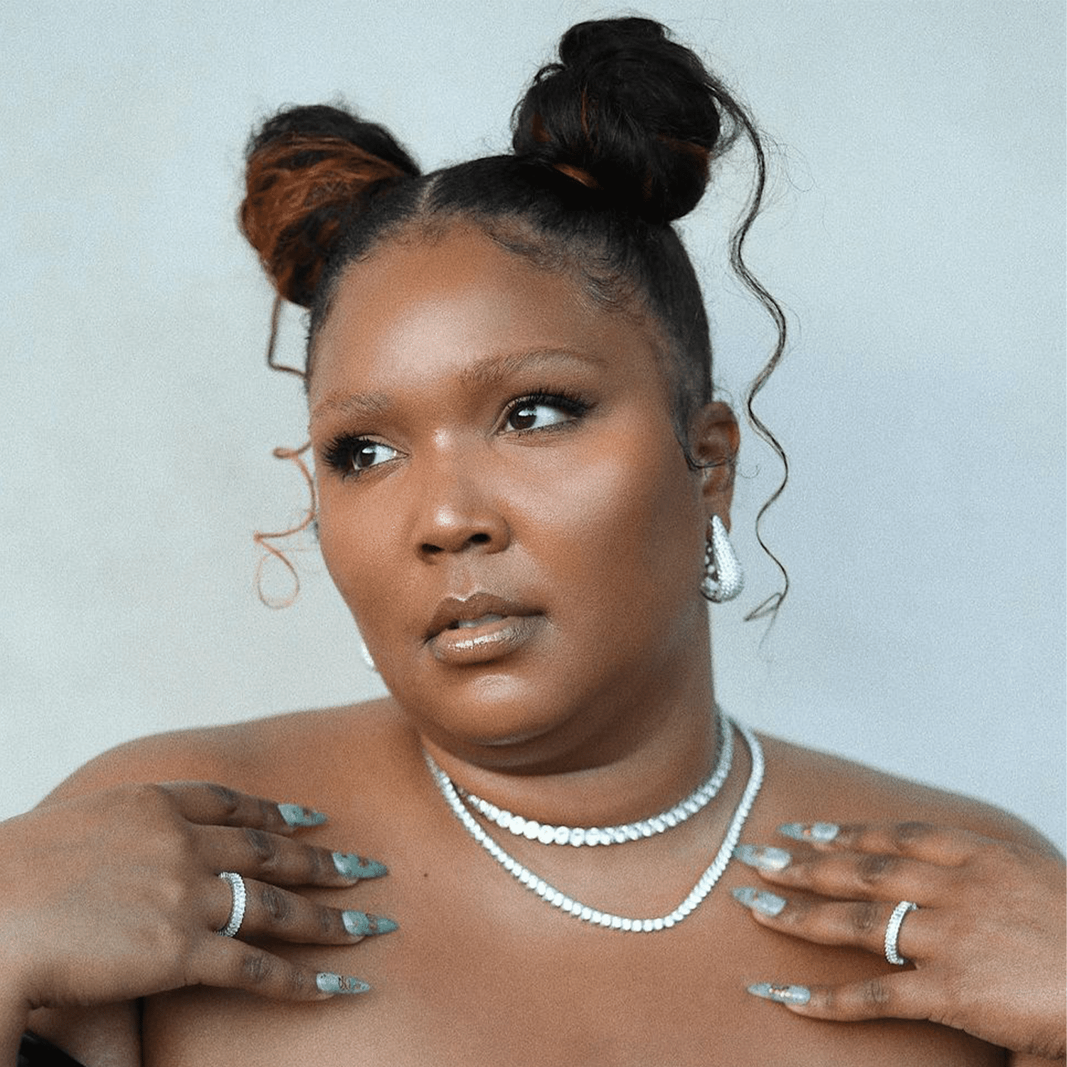 lizzo wearing space buns