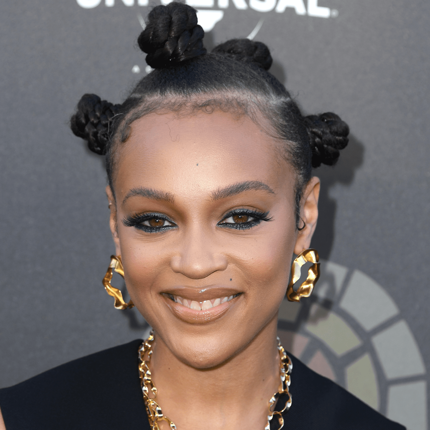 woman wearing bantu knots