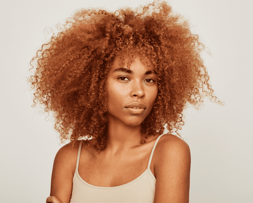 woman with curly ginger hair