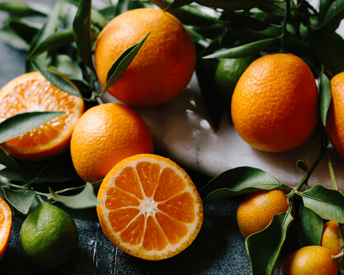 oranges on cutting board