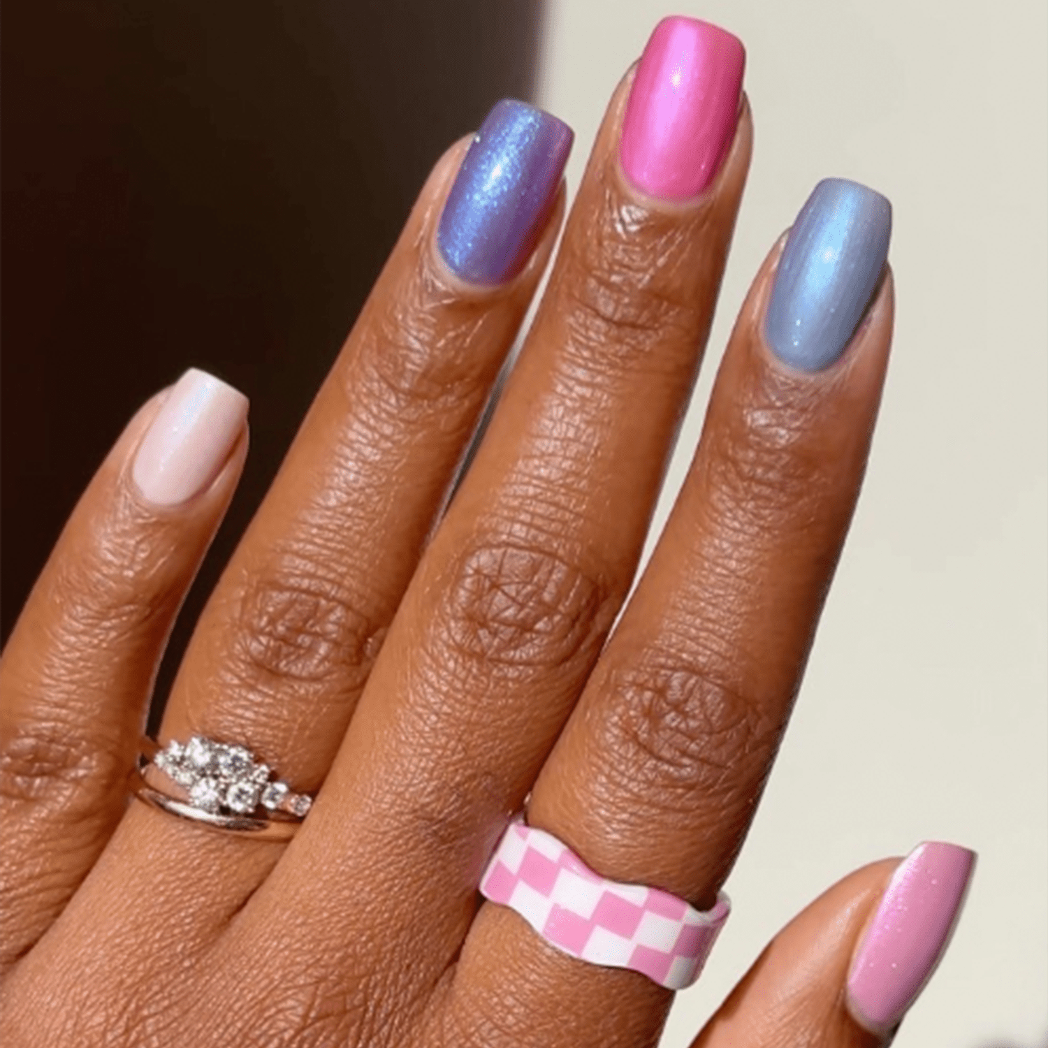 pink, blue, and purple chrome nails