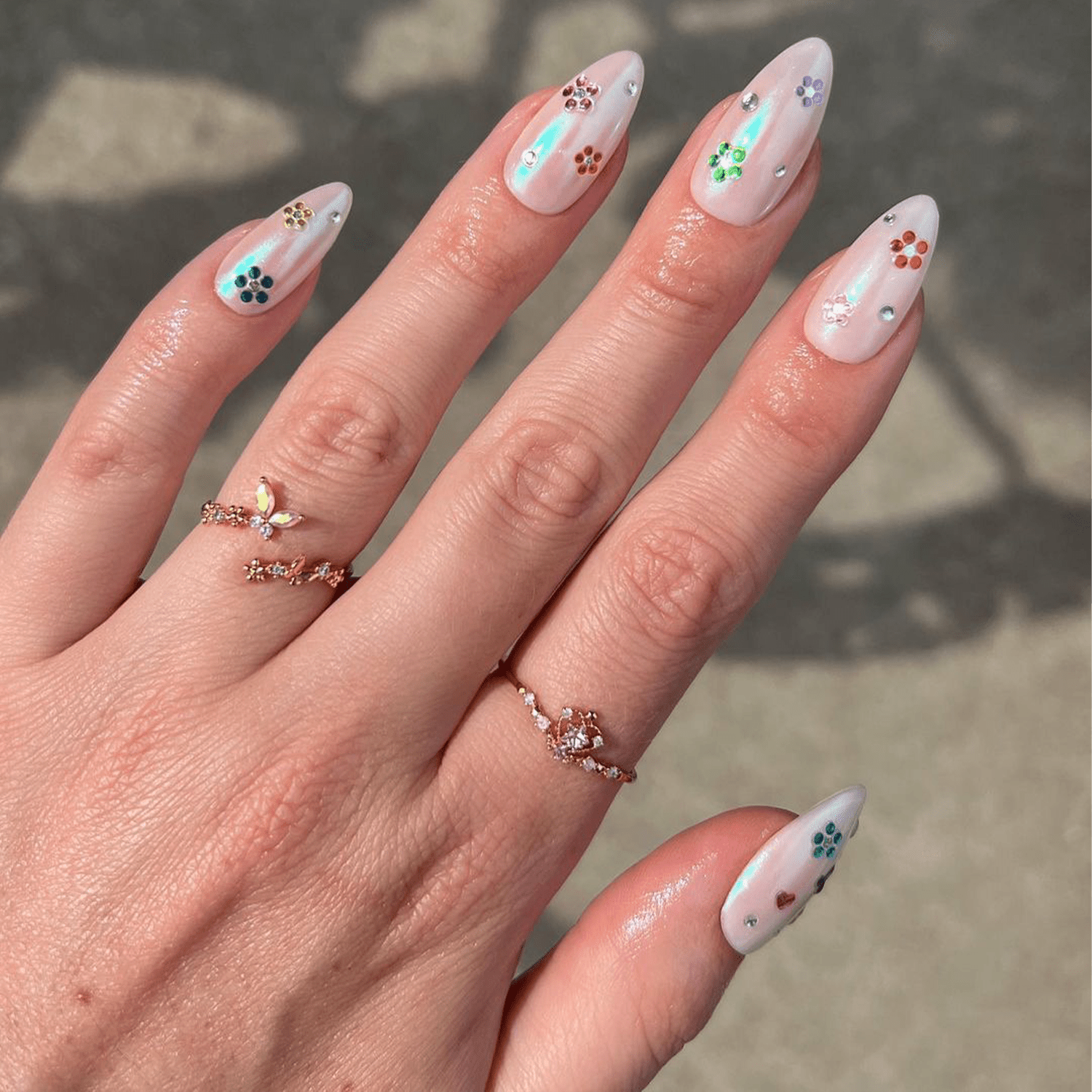 chrome nails with floral gems