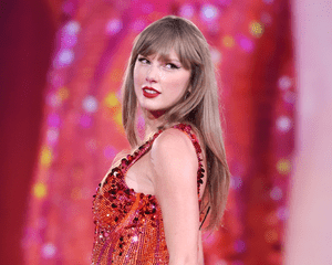 Taylor Swift wearing red sequined bodysuit on Eras Tour