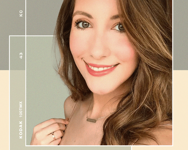 Woman Smiling at the Camera Showcasing her New Veneers